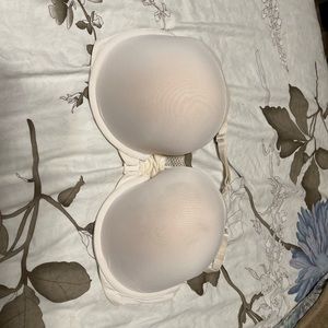 Cream colored Victoria’s Secret sports bra